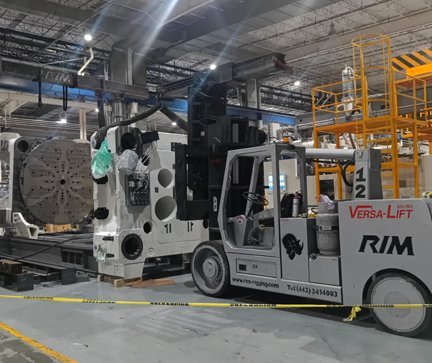 Riggers Versa-Lift installation CNC machinery Mexico facility AZVIR